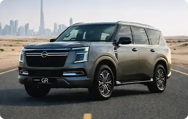 Nissan Patrol SUV parked in Dubai cityscape, luxury 4x4 rental