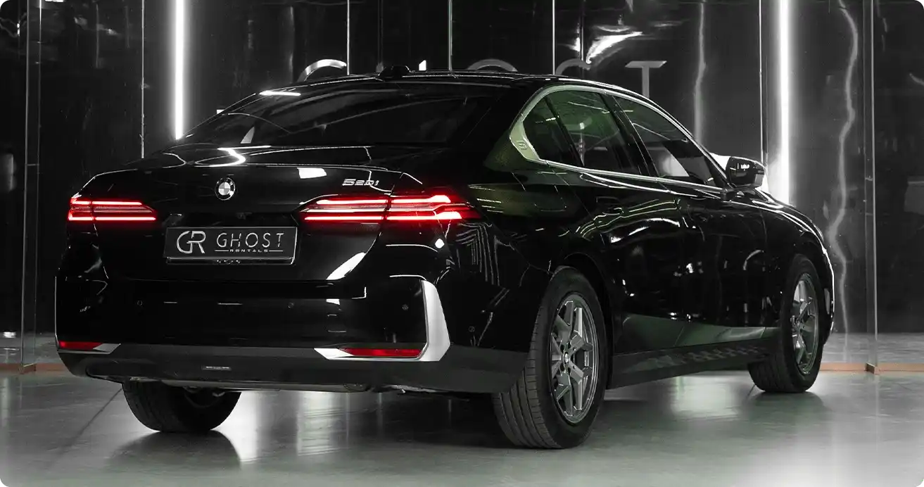 Luxury BMW 5-Series 520i rental Dubai - Premium black sedan hire from AED 699/day in UAE