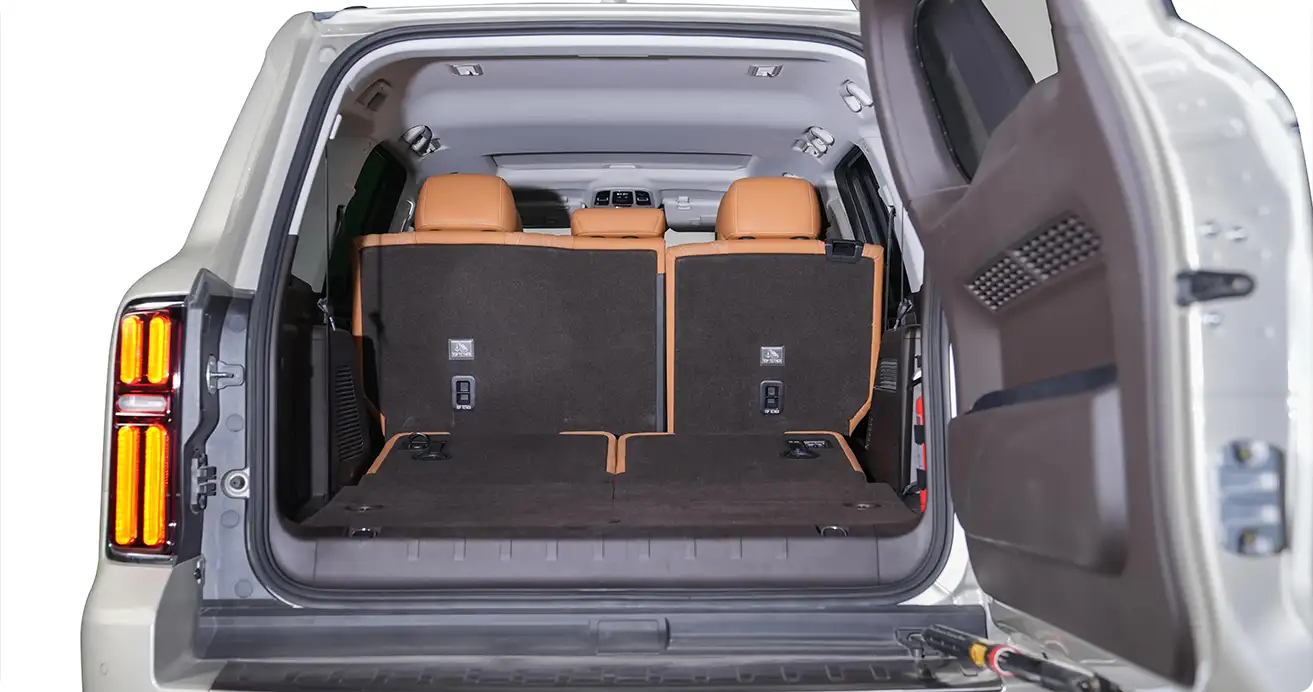 Tank 500 luxury SUV on a desert road, car hire Dubai for adventurous trips